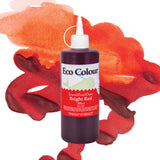A bottle of Eco Colour Liquid Food Dyes in Bright Red, 500ml, featuring a white pointed nozzle cap and a label showing a whale illustration. The dark red liquid is described as Non Toxic, shown against a backdrop of red and orange watercolour splashes.