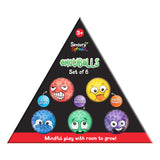 Triangular black packaging for Sensory Sprouts EmotiBalls Set of 6, displaying six textured sensory balls with expressive emoji faces in red, yellow, blue, green, and purple colours. Text reads "3+", "Soft, calming textures!", "Builds emotional understanding", "Mindful moments!" and "Mindful play with room to grow!"