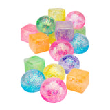 Collection of translucent sensory shapes in spheres and cubes featuring vibrant colours including pink, purple, yellow, orange, green, and blue. Each Sensory Sprouts Stretch & Sparkle Shape contains glitter particles suspended within, creating a sparkling effect throughout the flexible, tactile materials suitable for sensory play.