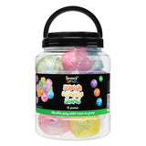 Clear plastic jar with black carry handle containing 12 translucent, glitter-filled stretchy shapes in vibrant colours including pink, yellow, blue, green, and purple. The Sensory Sprouts Stretch & Sparkle Shapes label features colourful circles with text "Squish Me!", "Squeeze Me!", and "Stretch Me!" along with "Mindful play with room to grow!"