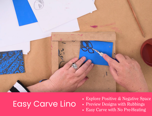 Zart Education PL The Essentials of Printing – A top-down view of an easy-carve lino demonstration showing hands carving a leaf-shaped design into a blue lino block using a lino cutter. Surrounding the workspace are printed samples, tools, pencils, and paper on a kraft paper surface. A pink banner along the bottom features the text: “Easy Carve Lino – Explore Positive & Negative Space · Preview Designs with Rubbings · Easy Carve with No Pre-Heating.”