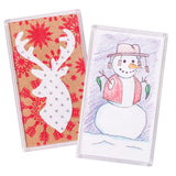 Two Zart Magnet Clear Frames stand side by side, each holding a decorated card behind clear plastic. The left frame shows a white reindeer head with silver dot detailing on a red snowflake-patterned kraft background. The right frame holds a coloured pencil snowman wearing a hat, scarf, and mitten-shaped gift tags.