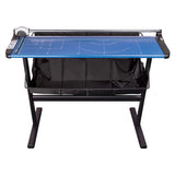 Ledah professional rotary paper trimmer, the larger model mounted on a black steel stand with a fabric collection basket beneath. The blue metal cutting base carries a chrome track runner, grey rotary cutting head at the left rail, and printed size guides and measurement scales.