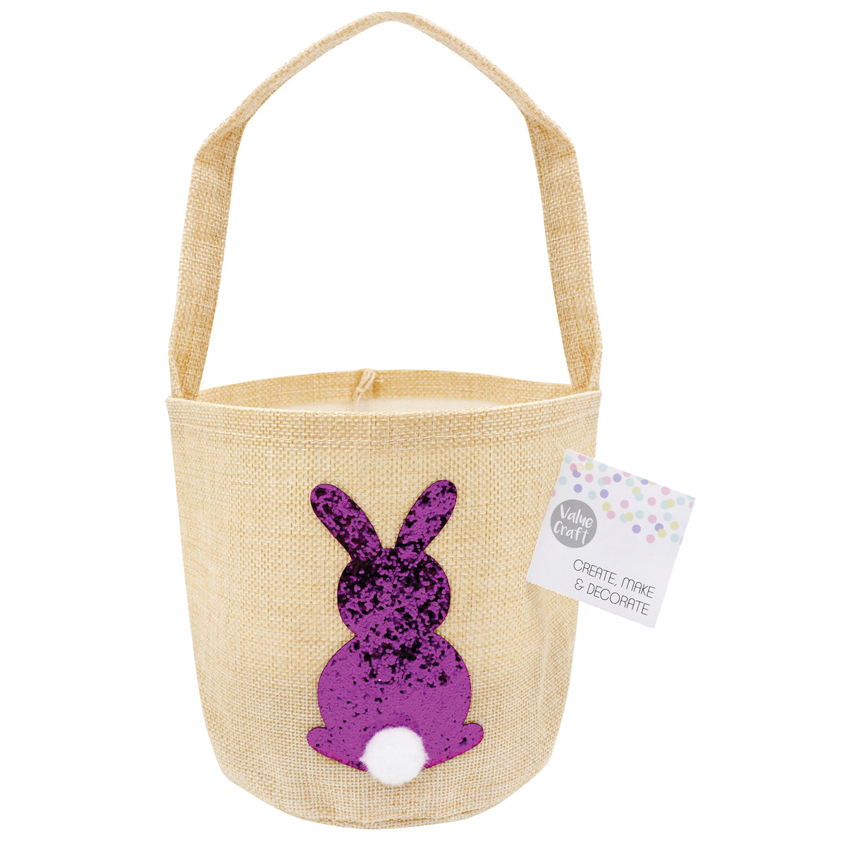 Natural hessian basket with woven handle featuring a purple sequined bunny silhouette with white fluffy tail. Attached tag reads "Value Craft CREATE MAKE & DECORATE" with pastel polka dot design. Cylindrical basket shape measuring 14 x 14cm, perfect for Easter crafts and decoration.