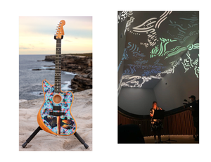 Decorated acoustic guitar photographed on a coastal cliff and a performance space with projected illustrated patterns across walls and ceiling. From Zart Education Live Online with Kirli Saunders – images provided by Lilli Paton on behalf of the artist, Kirli Saunders