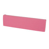Pink clay block in a soft, mid-tone shade. Rectangular form with rounded ends and ribbed sides. Surface appears smooth and matte with a gentle, even finish.