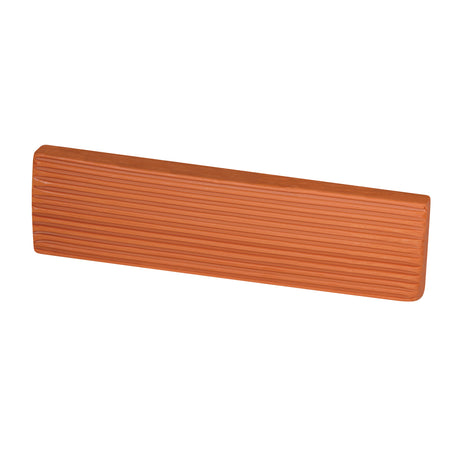 Terracotta clay block in a warm, earthy orange-brown tone. Long rectangular shape with rounded edges and ridged sides. Surface appears smooth with a soft, matte finish and natural variation.