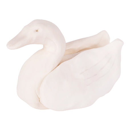Hand-sculpted swan form made from white Crayola Model Magic, featuring smooth, rounded contours and a gently curved neck, with subtle surface texture and slight cracking visible, demonstrating the material’s soft, pliable consistency and ability to hold simple, organic sculptural shapes.