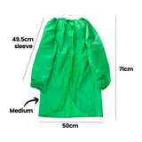 A green Zart smock shown flat with annotated measurements: 71cm total length, 50cm width and a 49.5cm sleeve length, labelled "Medium". The elasticated neckline gathers into folds, with long sleeves ending in elasticated cuffs and a curved, uneven hemline at the front.