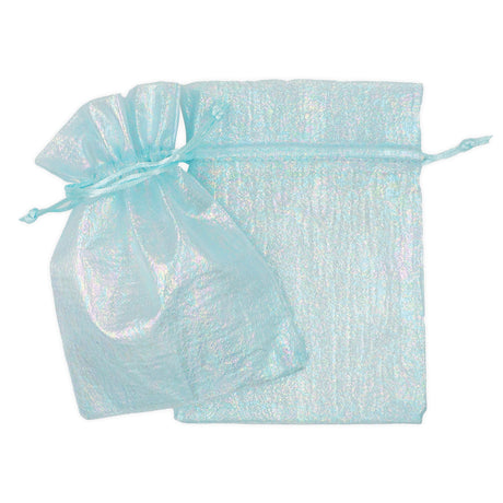 Three sheer organza bags in pale aqua blue with iridescent shimmer, featuring drawstring closures. One bag is shown gathered and tied, whilst another displays the full flat rectangular shape, highlighting the translucent, sparkly fabric texture measuring 17 x 12.5cm.
