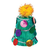 Zart Mini Patty Pans stacked and layered into a tiered Christmas tree shape, using shimmering green metallic pans in graduating tiers. Decorated with large flat sequins in pink, purple, green, red and gold, wrapped with silver tinsel garland, and topped with a fluffy yellow and orange pom-pom.