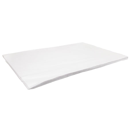 A neatly stacked pile of white Zart Tissue Paper 50x75cm sheets rests against a pale grey background. The thin lightweight sheets display soft folded edges, subtle translucency, and delicate layered corners, emphasising the smooth fine texture and flexible paper construction.