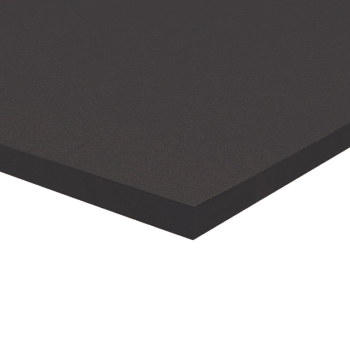 A corner of a stack of black Zart Cover Paper shown at an angle against a white background. The top sheet has a smooth, even surface, and the layered edge reveals the depth of the pack with its neatly aligned sheets.