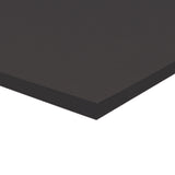 A corner of a stack of black Zart Cover Paper shown at an angle against a white background. The top sheet has a smooth, even surface, and the layered edge reveals the depth of the pack with its neatly aligned sheets.