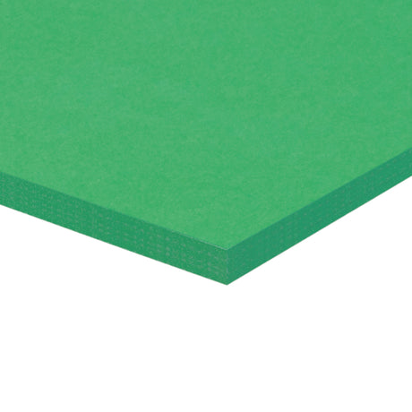 A corner of a stack of green Zart Cover Paper shown at an angle against a white background. The top sheet has a smooth, even surface, and the layered edge reveals the depth of the pack with its neatly aligned sheets.