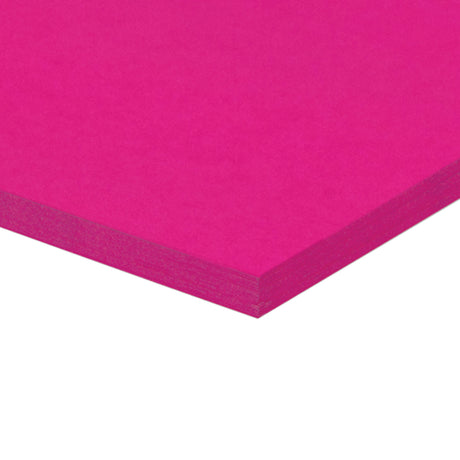 A corner of a stack of hot pink Zart Cover Paper shown at an angle against a white background. The top sheet has a smooth, even surface, and the layered edge reveals the depth of the pack with its neatly aligned sheets.