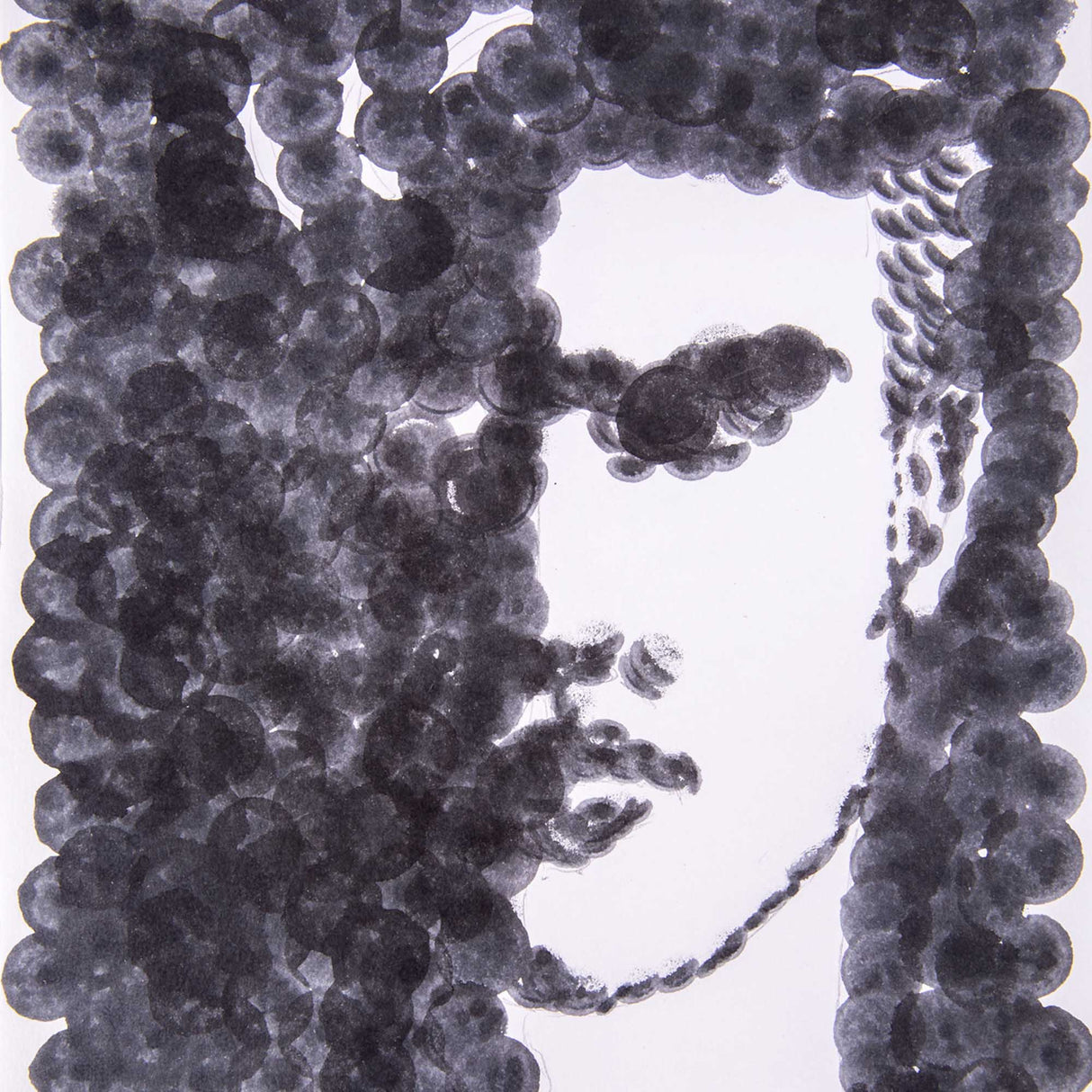 Close-up of a monochrome dot artwork forming a stylised face. Overlapping black sponge stamps create dense texture around the head, leaving the facial area mostly white.