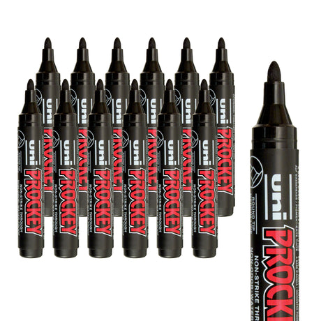 A group of black Uni Prockey markers with rounded bullet tips arranged in staggered rows against a light grey background. One enlarged marker appears cropped along the right side, highlighting the bullet nib shape and bold red “PROCKEY” branding on the matte black barrel.
