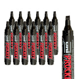 A collection of black Uni Prockey markers with broad chisel tips arranged in layered rows on a pale grey background. An enlarged cropped marker on the right emphasises the angled chisel nib and the bold red and white “PROCKEY” branding across the black barrel.