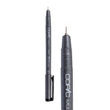 A Copic Multi Liner fineliner pen with a 0.1mm nib, shown uncapped alongside a close-up of the tip. The dark grey speckled barrel displays white "COPIC MULTI LINER" lettering and a black clip on the cap. The metal-collared nib is very fine, extending to a sharp black point.