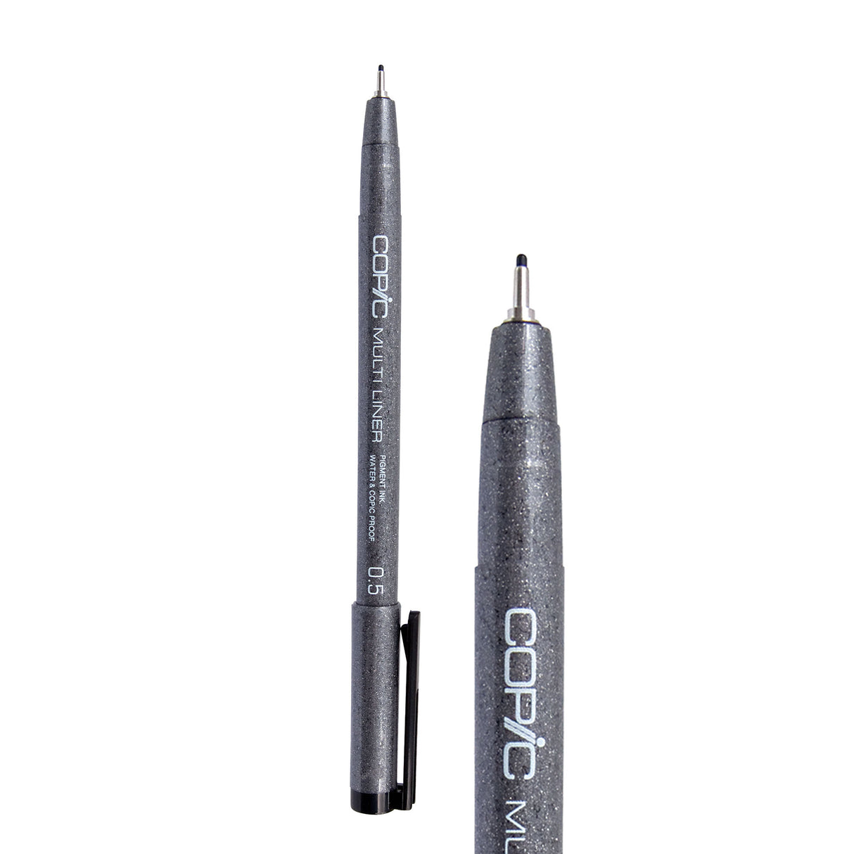 A Copic Multi Liner fineliner pen with a 0.5mm nib, shown uncapped alongside a close-up of the tip. The dark grey speckled barrel displays white "COPIC MULTI LINER" lettering and a black clip on the cap. The metal-collared nib extends to a slightly broader black point.