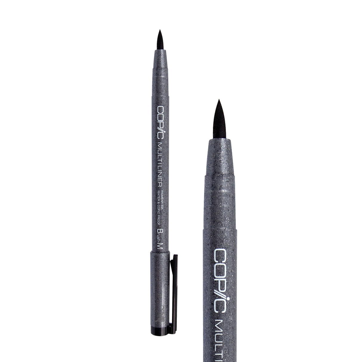 A Copic Multiliner brush tip pen shown uncapped alongside a close-up of the tip. The dark grey speckled barrel displays white "COPIC MULTILINER" lettering and a black clip on the cap. The flexible black brush tip comes to a pointed tip, distinct from the metal-collared fineliner nibs in the range.