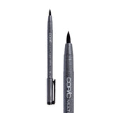 A Copic Multiliner brush tip pen shown uncapped alongside a close-up of the tip. The dark grey speckled barrel displays white "COPIC MULTILINER" lettering and a black clip on the cap. The flexible black brush tip comes to a pointed tip, distinct from the metal-collared fineliner nibs in the range.