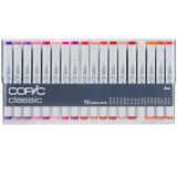 A clear plastic case holding Copic Classic markers arranged in two horizontal rows. The markers have white barrels with grey ends and coloured caps in shades of purple, pink, red, orange, and peach.