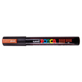 A uni POSCA paint marker shown horizontally against a white background. The glossy black cylindrical barrel carries the colourful POSCA branding and is topped by a uni clip, with the coloured cap or exposed bullet nib indicating the paint colour inside.