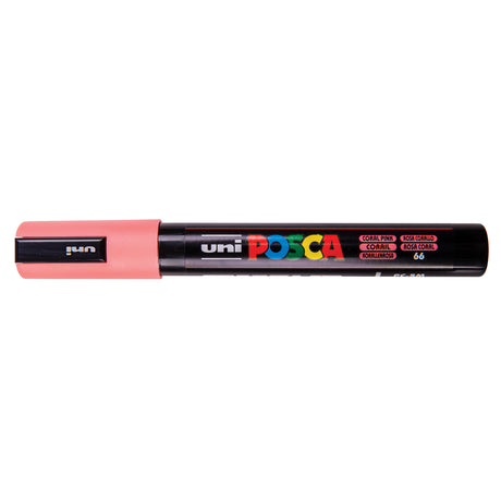 A uni POSCA paint marker shown horizontally against a white background. The glossy black cylindrical barrel carries the colourful POSCA branding and is topped by a uni clip, with the coloured cap or exposed bullet nib indicating the paint colour inside.