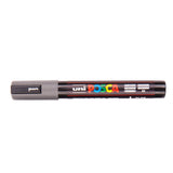 A uni POSCA paint marker shown horizontally against a white background. The glossy black cylindrical barrel carries the colourful POSCA branding and is topped by a uni clip, with the coloured cap or exposed bullet nib indicating the paint colour inside.