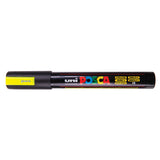 A uni POSCA paint marker shown horizontally against a white background. The glossy black cylindrical barrel carries the colourful POSCA branding and is topped by a uni clip, with the coloured cap or exposed bullet nib indicating the paint colour inside.