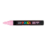 A uni POSCA paint marker shown horizontally against a white background. The glossy black cylindrical barrel carries the colourful POSCA branding and is topped by a uni clip, with the coloured cap or exposed bullet nib indicating the paint colour inside.