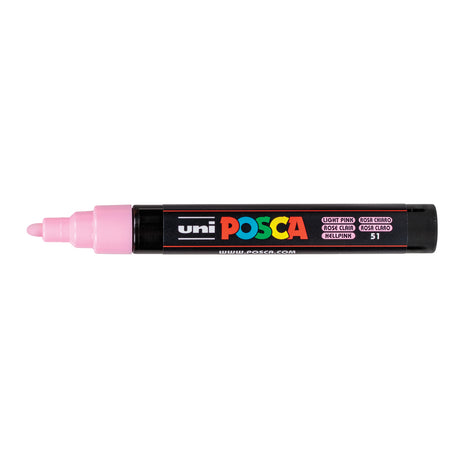 A uni POSCA paint marker shown horizontally against a white background. The glossy black cylindrical barrel carries the colourful POSCA branding and is topped by a uni clip, with the coloured cap or exposed bullet nib indicating the paint colour inside.