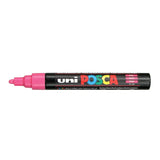 A uni POSCA paint marker shown horizontally against a white background. The glossy black cylindrical barrel carries the colourful POSCA branding and is topped by a uni clip, with the coloured cap or exposed bullet nib indicating the paint colour inside.