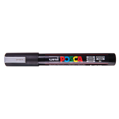 A uni POSCA paint marker shown horizontally against a white background. The glossy black cylindrical barrel carries the colourful POSCA branding and is topped by a uni clip, with the coloured cap or exposed bullet nib indicating the paint colour inside.