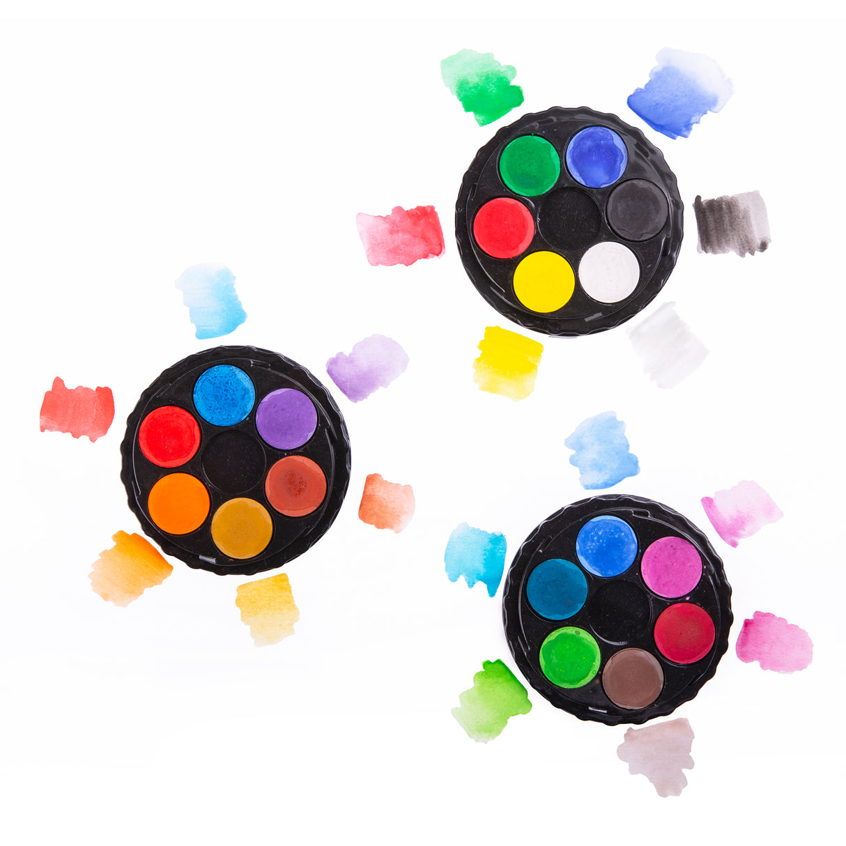Set of three round paint palettes with colorful paint samples on a white background