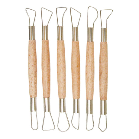 Six wire-ended modelling tools arranged upright in a row, each with a natural timber handle and metal ferrules at both ends. Shaped stainless steel wire loops in assorted forms — triangular, teardrop and curved — extend from each end for hollowing, carving and refining clay.